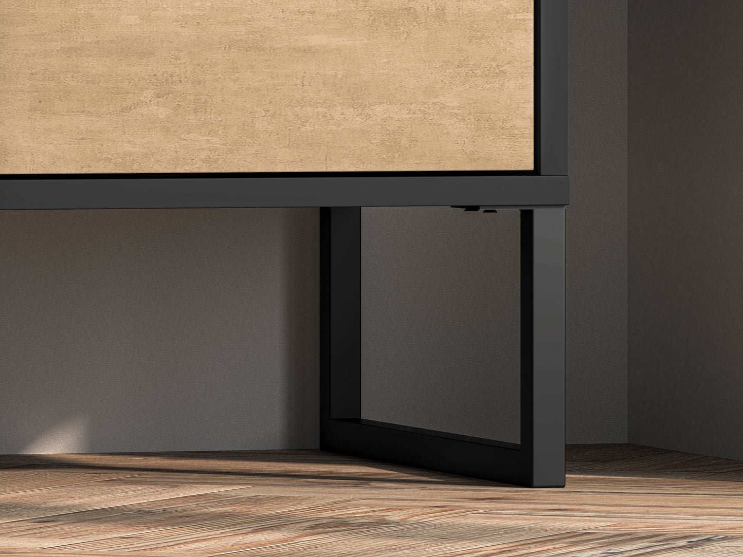 Zdjęcie przedstawiające nogi nowoczesnej komody Kolt. Nowoczesna komoda Kolt posiada czarne nóżki, które podkreślają jej loftowy charakter.