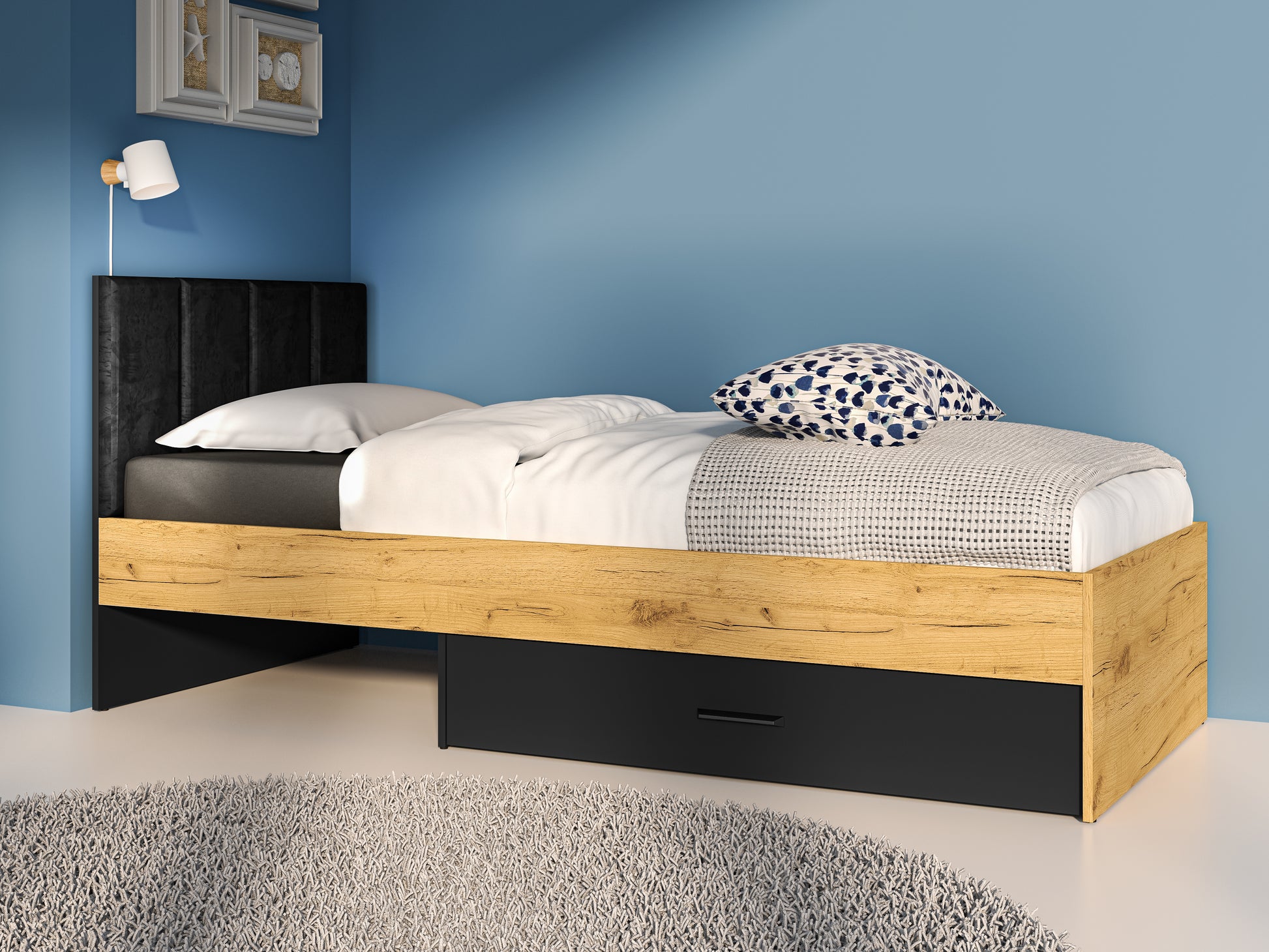 Zdjęcie przedstawiające przykładową aranżację nowoczesnego łóżka w stylu LOFT z szufladą pełniącą rolę pojemnika na pościel z welurowym zagłówkiem oraz stelażem przystosowanym do materaca w rozmiarze 90x200 cm. 