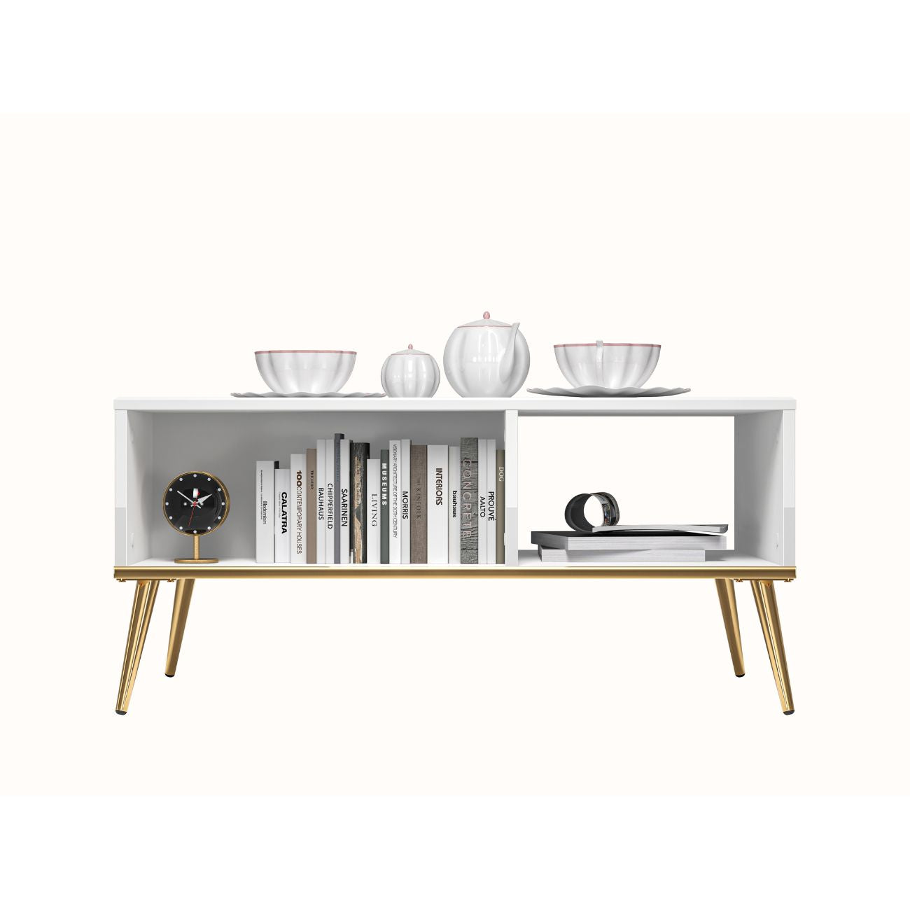 Zdjęcie przedstawiające nowoczesny stolik kawowy z zaaranżowanymi półkami. Stolik kawowy 90x60 cm sprawdzi się w Twoim salonie