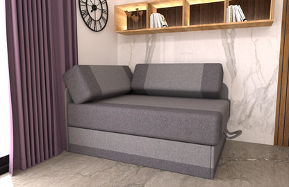 Przykładowa aranżacja z zastosowaniem fotela tapczanu sofy rozkładanej w połączeniu koloru jasno i ciemno szarego w niewielkim pomieszczeniu.