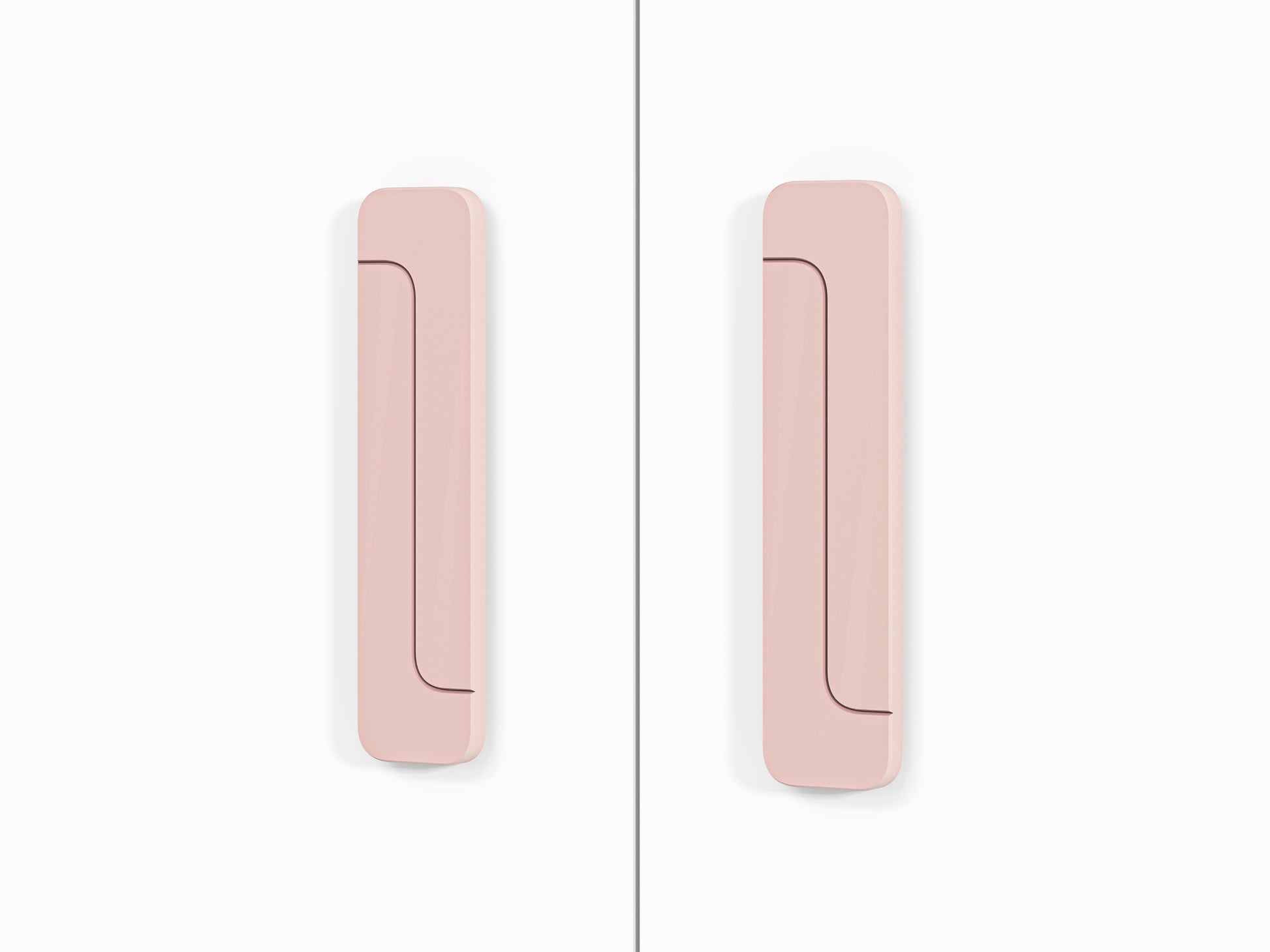 Zbliżenie na różowe uchwyty zastosowane w szafie oraz innych elementach systemu MICK.