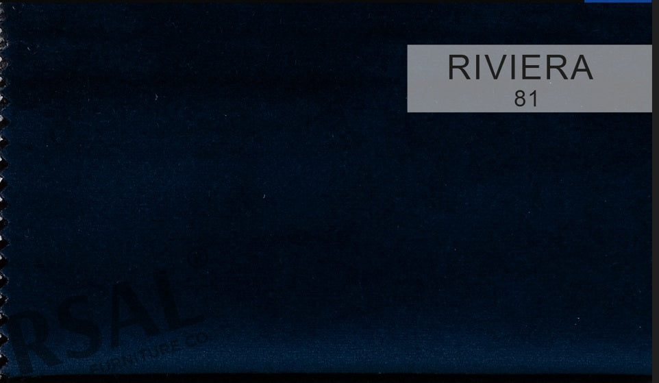 RIVIERA to aksamitna tkanina z gatunku velvet. Cechuje się wysoką odpornością na ścieranie oraz podwyższoną odpornością na uszkodzenia. Posiada mikrowłoski pełniące rolę ochrony przed kurzem i brudem. Na zdjęciu RIVIERA 81 w kolorze ciemnoniebieskim.