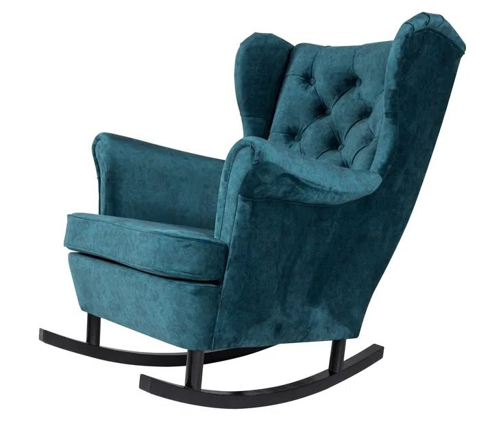 Bok fotela bujanego uszak CHESTERFIELD MANCHESTER płozy ukazuje elegancję oraz niezwykła estetykę mebla.