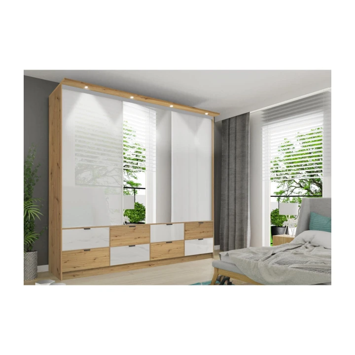Na zdjęciu przedstawiono Pojemna szafa przesuwna z lustrem Malaga 250 cm LED