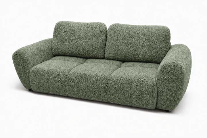 Na zdjęciu uwidoczniona jest nowoczesna pikowana sofa do salonu Agnello Morska Zielona Boucle