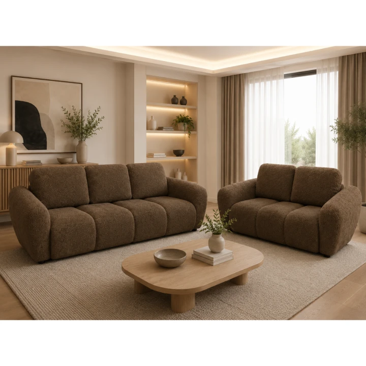 Na zdjęciu przedstawiono zestaw wypoczynkowy do salonu kanapa rozkładana  Agnello Cappuccino i sofa Dwójka Boucle