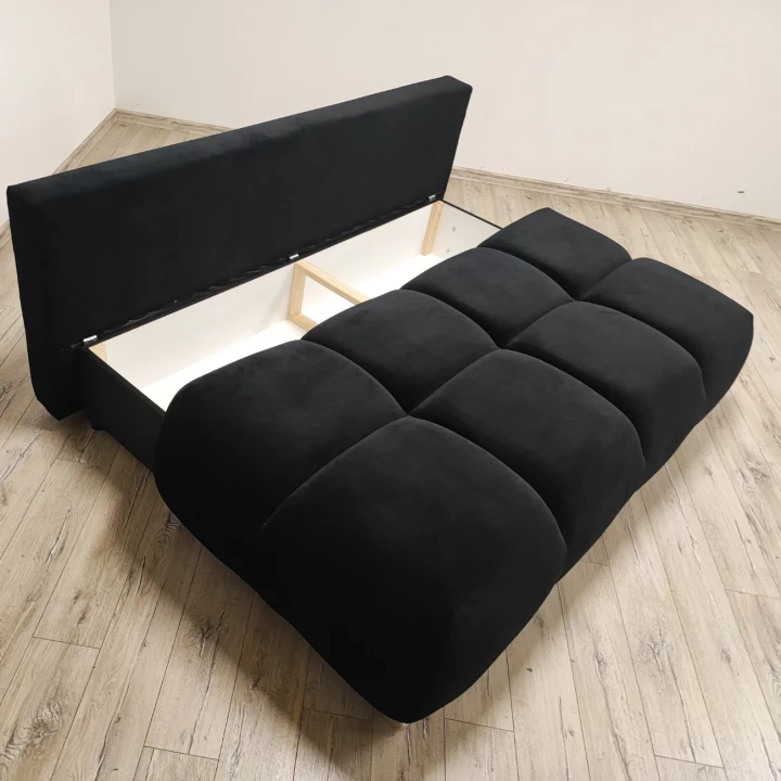 Na zdjęciu przedstawiono Czarna Kanapa sofa rozkładana z funkcją spania Honey Mini sprężyny pojemnik