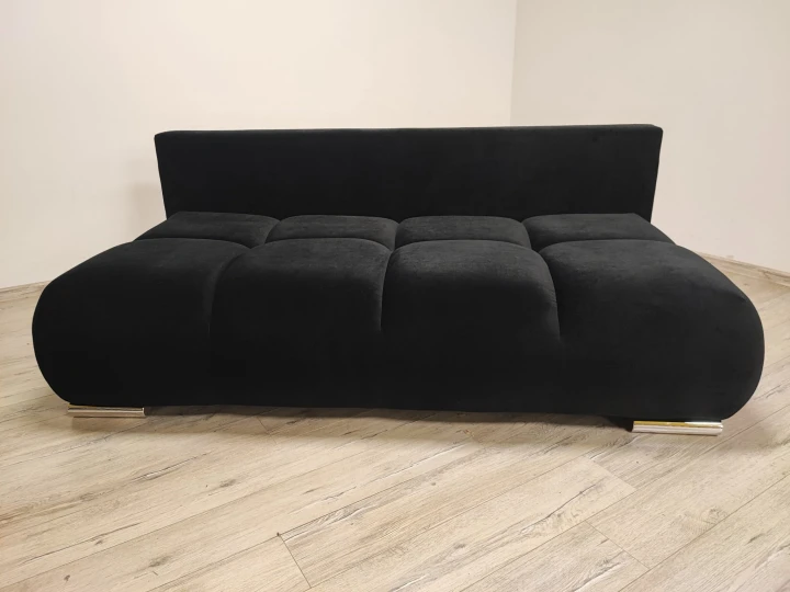 Na zdjęciu przedstawiono Czarna Kanapa sofa rozkładana z funkcją spania Honey Mini sprężyny pojemnik