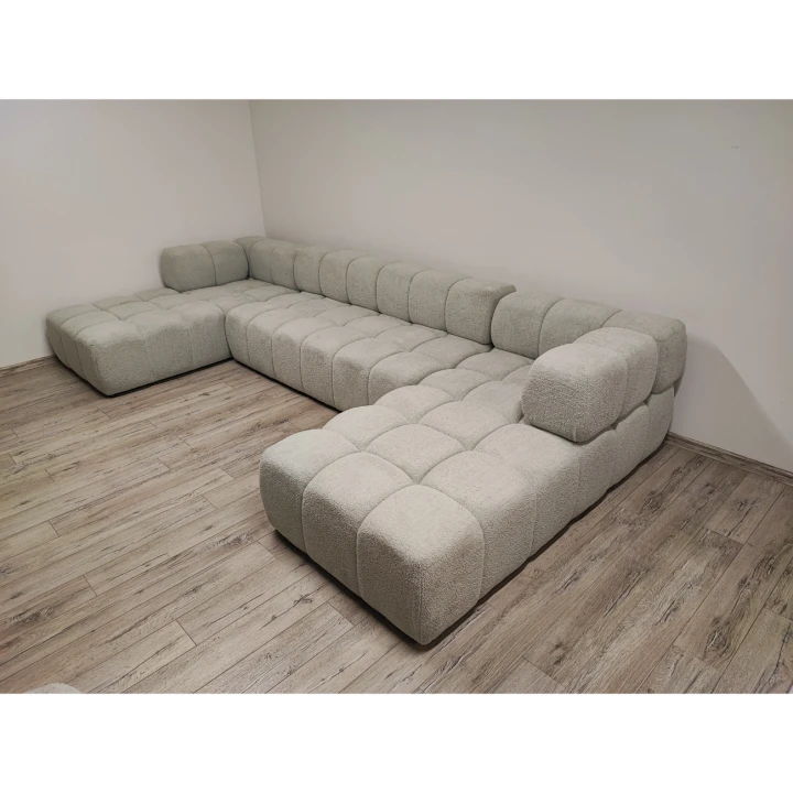 Na zdjęciu przedstawiono NOWOCZESNY PIKOWANY NAROŻNIK MODUŁOWY DO SALONU ROGÓWKA CLIXI U 369 CM